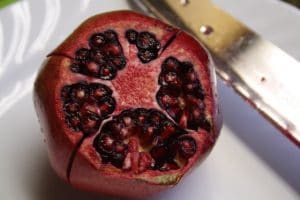 slice off the end and score the skin 4 times