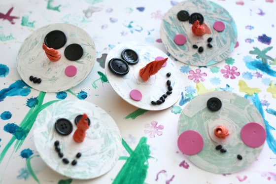 5 unique snowman ornaments made from old CDs