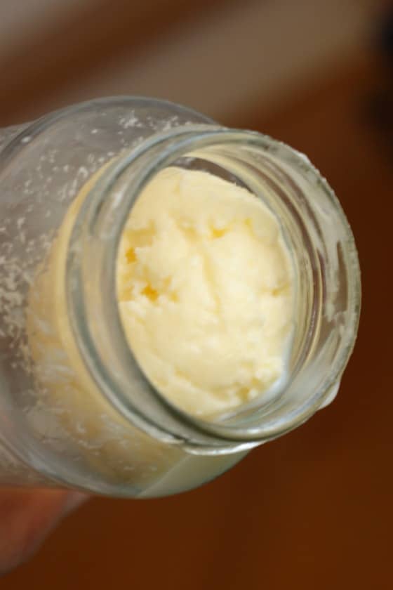 making homemade butter in a jar