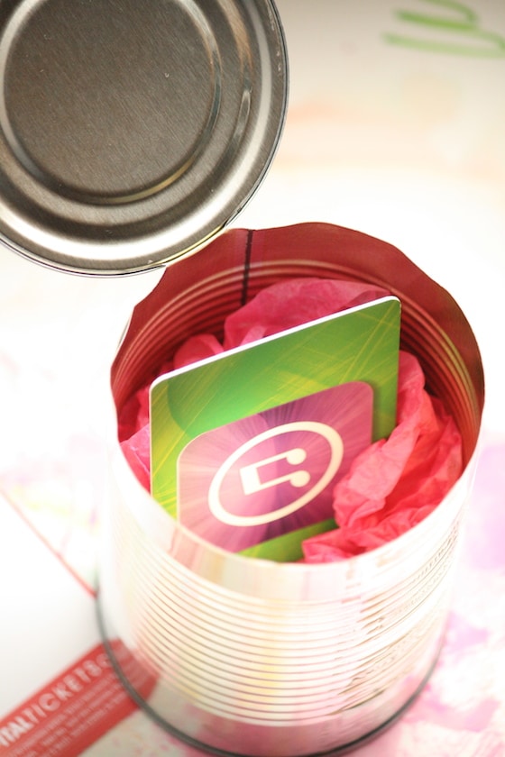 gift card and tissue paper in tin can