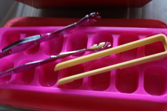 pink ice cube tray and small tongs for sorting