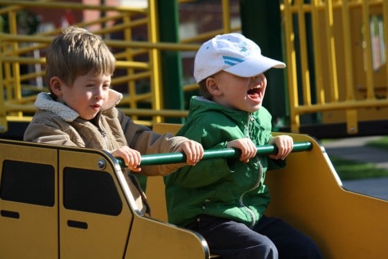 preschool boys laughing in the park