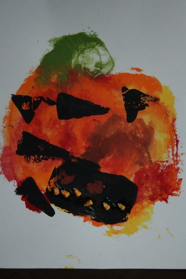 smoosh painted pumpkin made by preschooler