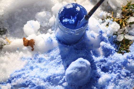 painting the snow with tempera paints