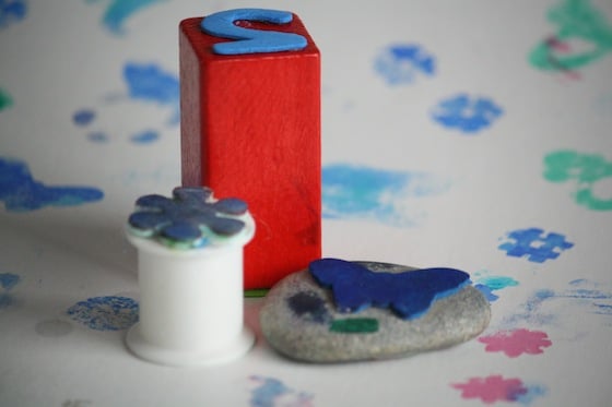 rock, spool and wooden block homemade stamps