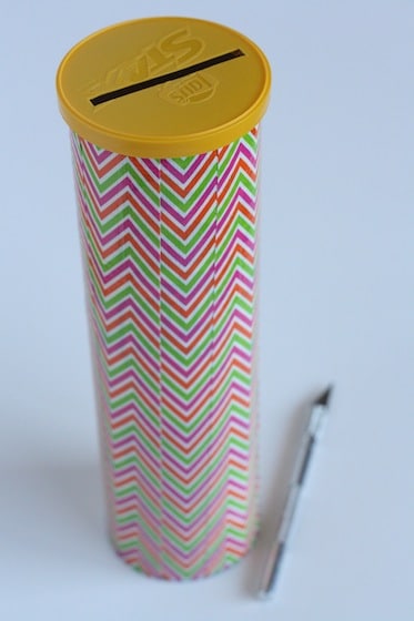 decorated pringles can and craft knife
