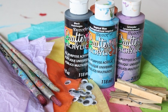 paint, tissue paper, paint brushes, googly eyes for butterfly craft 