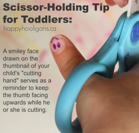 smiley face on thumbnail of scissor hand when learning to use scissors