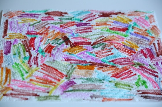 paper towel covered in marker scribbles