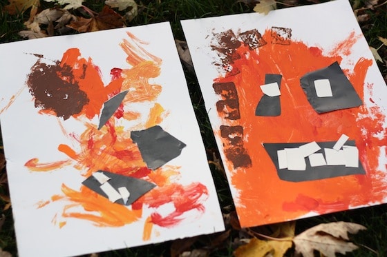 finished pumpkin paintings done by a toddler and preschooler