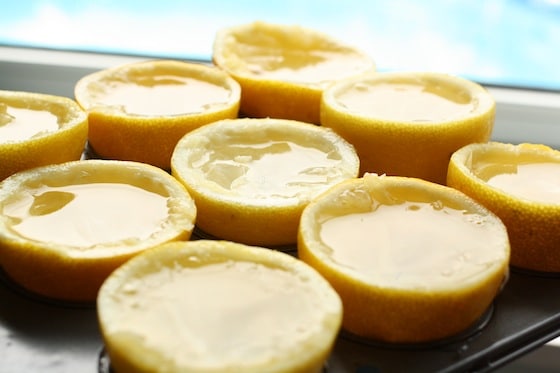 lemon rind cups filled with water