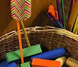 Wrapping paper roll fine motor drop activity