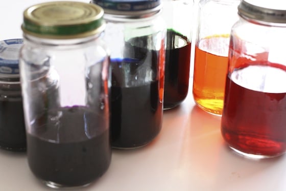 homemade liquid watercolor paints in baby food jars