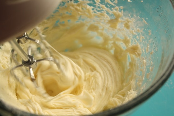 cream cheese and beaters in mixing bowl