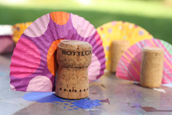 wine corks with cupcake liners glued to them