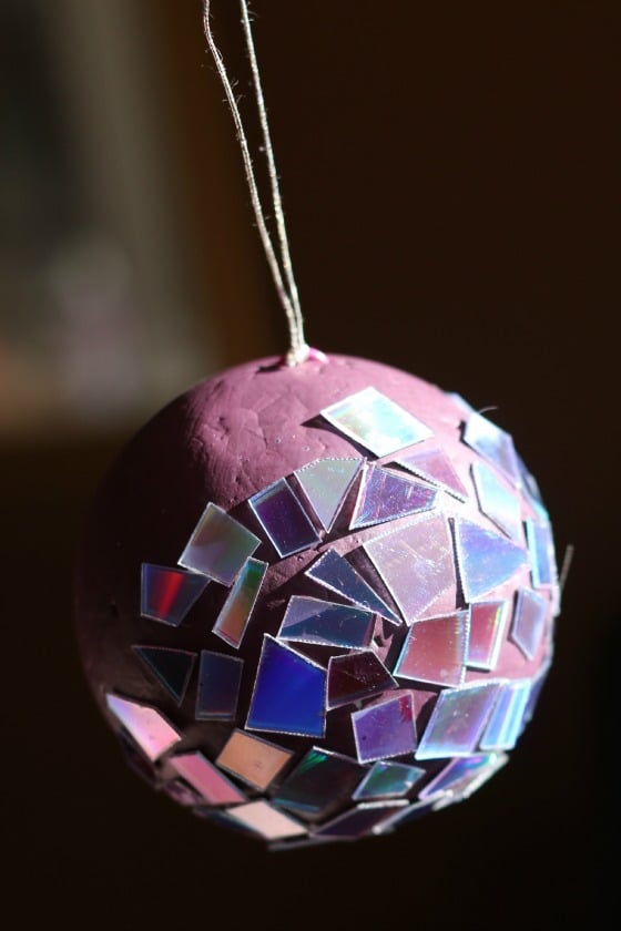making a Christmas ornament with styrofoam ball and cut up dvds