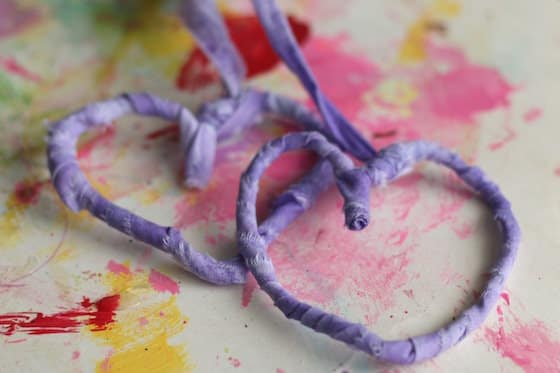 pipe cleaner hearts wrapped in fabric strips for Valentines day