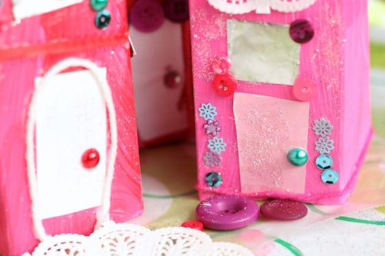 Milk cartons decorated as valentines houses