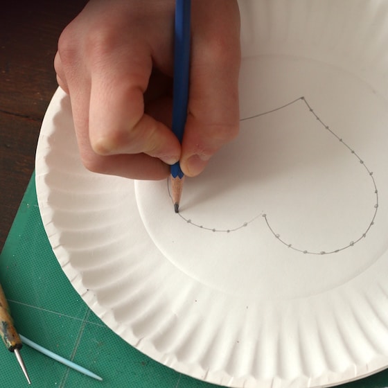 drawing a heart on a paper plate