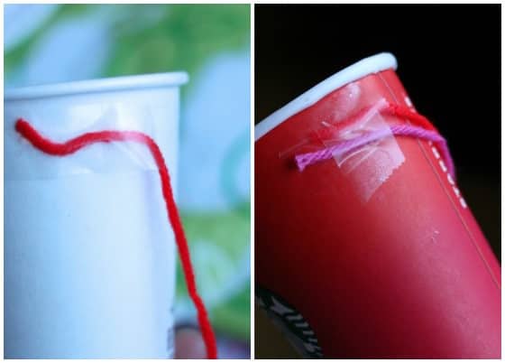 yarn taped to top of take-out coffee cup