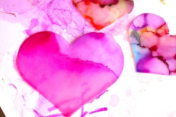 hearts coloured with sharpies and dripped with rubbing alcohol