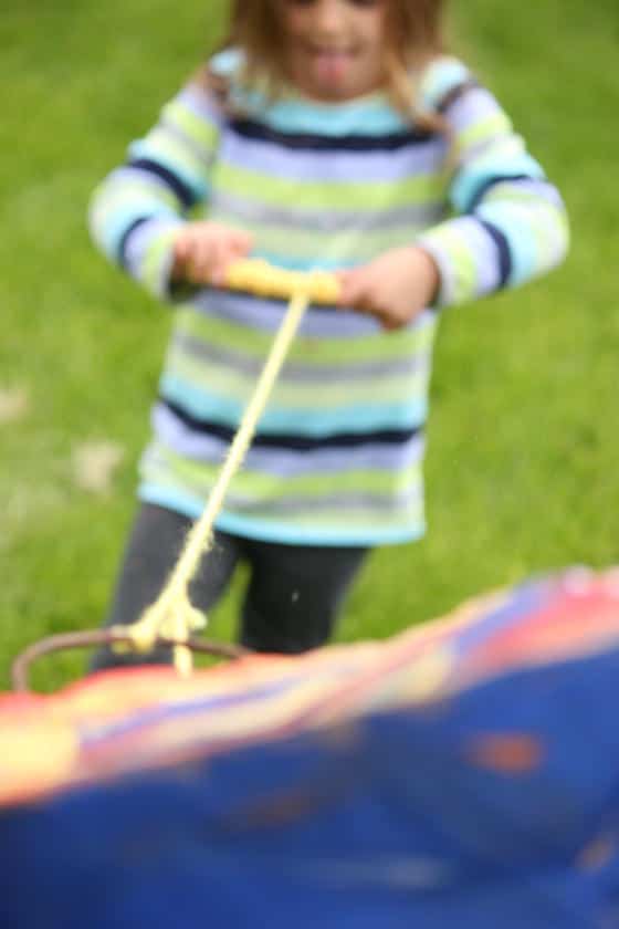 preschooler flying homemade kite