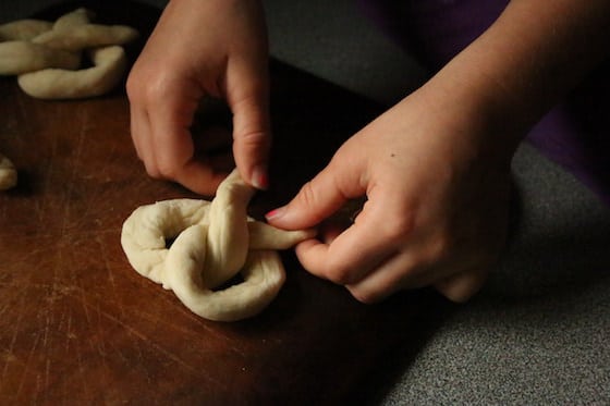 Twisting dough into soft pretzels