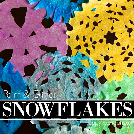 Painted, glittered coffee filter snowflakes