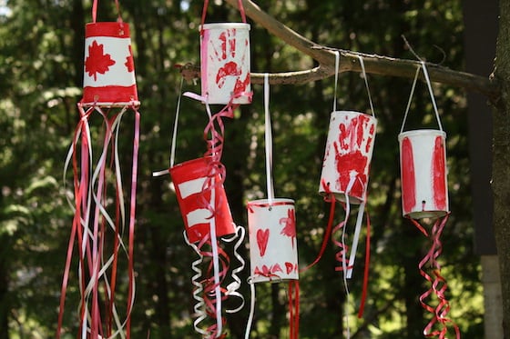Red and White Windsocks Hanging from Tree
