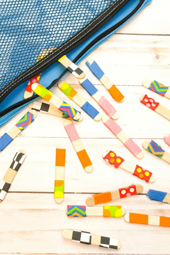 Craft Stick Dominoes spilling from pencil case