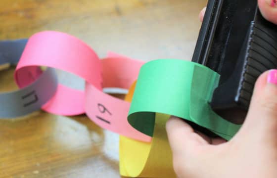 Stapling paper chain links together