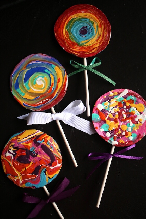 4 colourful painted lollypop Christmas ornaments 