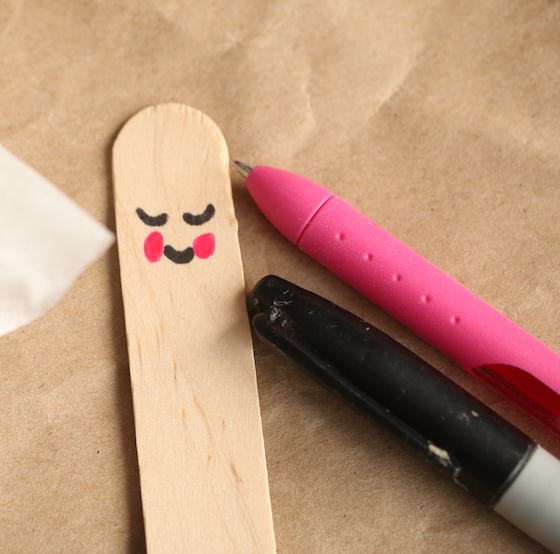 Angel face on popsicle stick