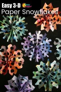 display of 3d snowflakes on marbled paper