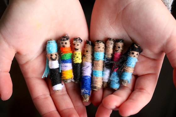 HandMade Worry Dolls in child's cupped hands