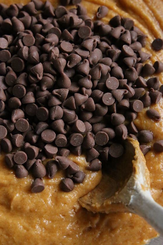 pumpkin cake batter with chocolate chips in bundt pan