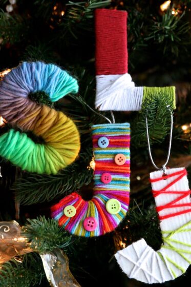 4-yarn-wrapped-initial-ornaments-on-Christmas-tree