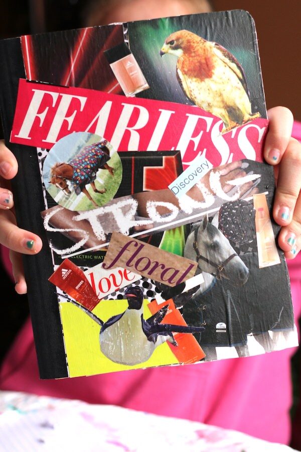 tween holding fearless journal