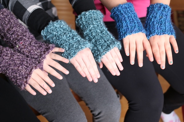 3 kids modelling homemade french knit fingerless gloves
