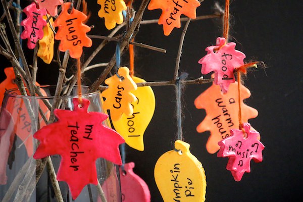 close up painted clay leaves on thankfulness tree