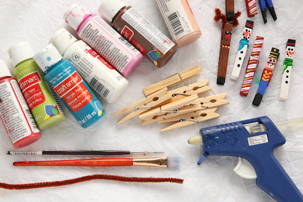 paint, clothespins, paintbrushes, glue gun, pipe cleane