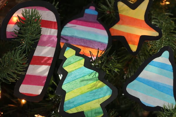 stained glass tissue paper cookie cutter ornaments hung in Christmas tree