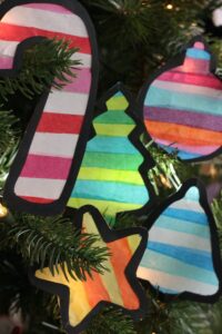 tissue paper stained glass christmas shapes on tree