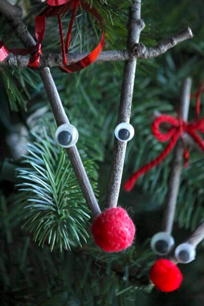 closeup twig reindeer face ornaments