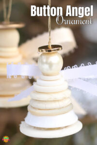 button angel ornament white stacked buttons cream angel in background