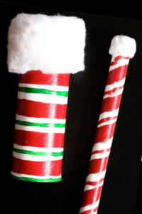 pringles can and cardboard roll painted like candy canes to watch sky for santa