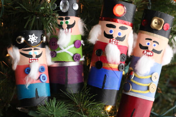 4 colourful cardboard roll nutcrackers standing in a row