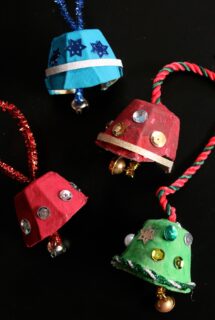 4 toddler made Egg Carton Jingle Bells