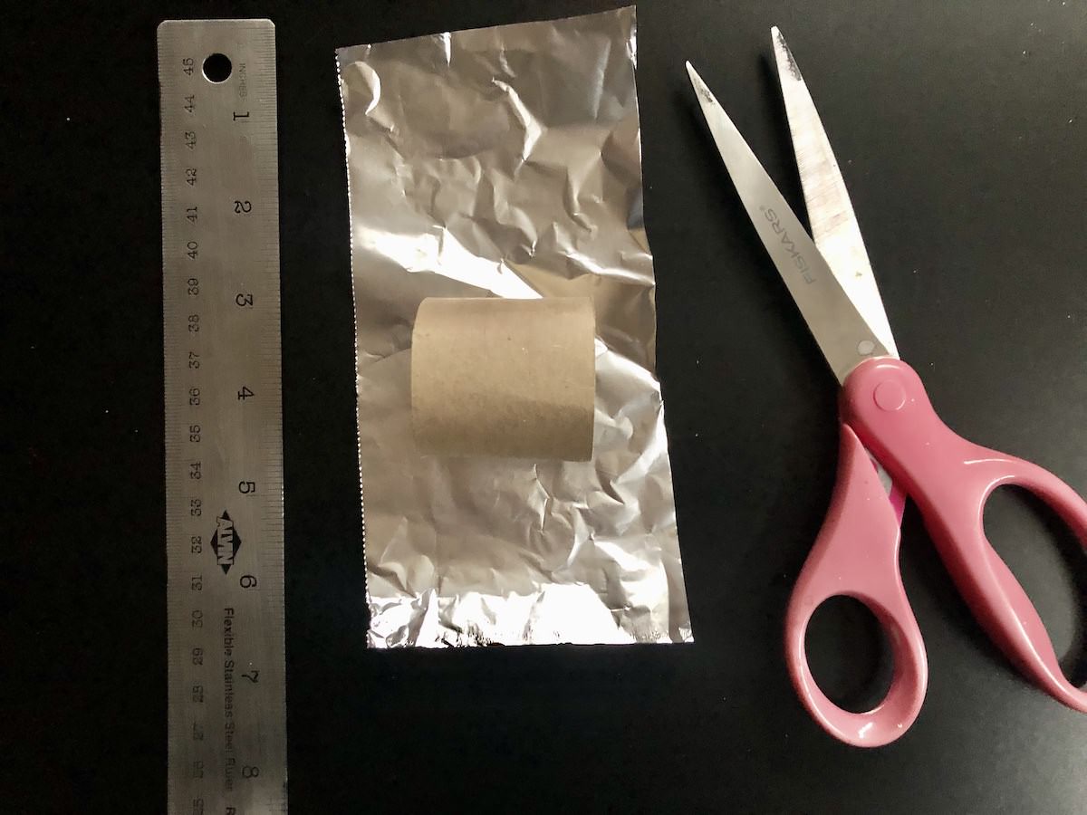 ruler, cardboard roll, foil and scissors